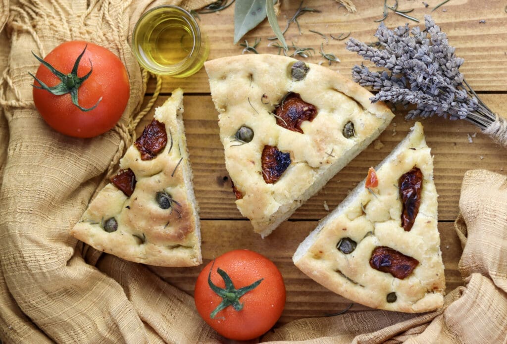 three pieces of freshly baked focaccia served on the table